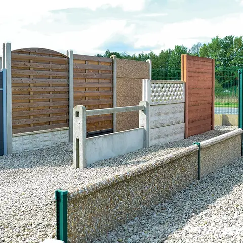 Clôture en plaques béton — réalisation Clôtures Caudevel