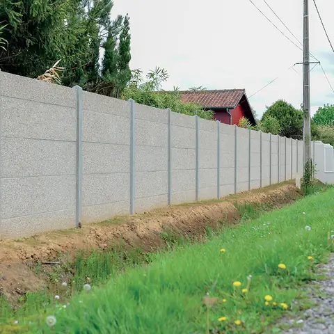 Clôture en plaques béton — réalisation Clôtures Caudevel